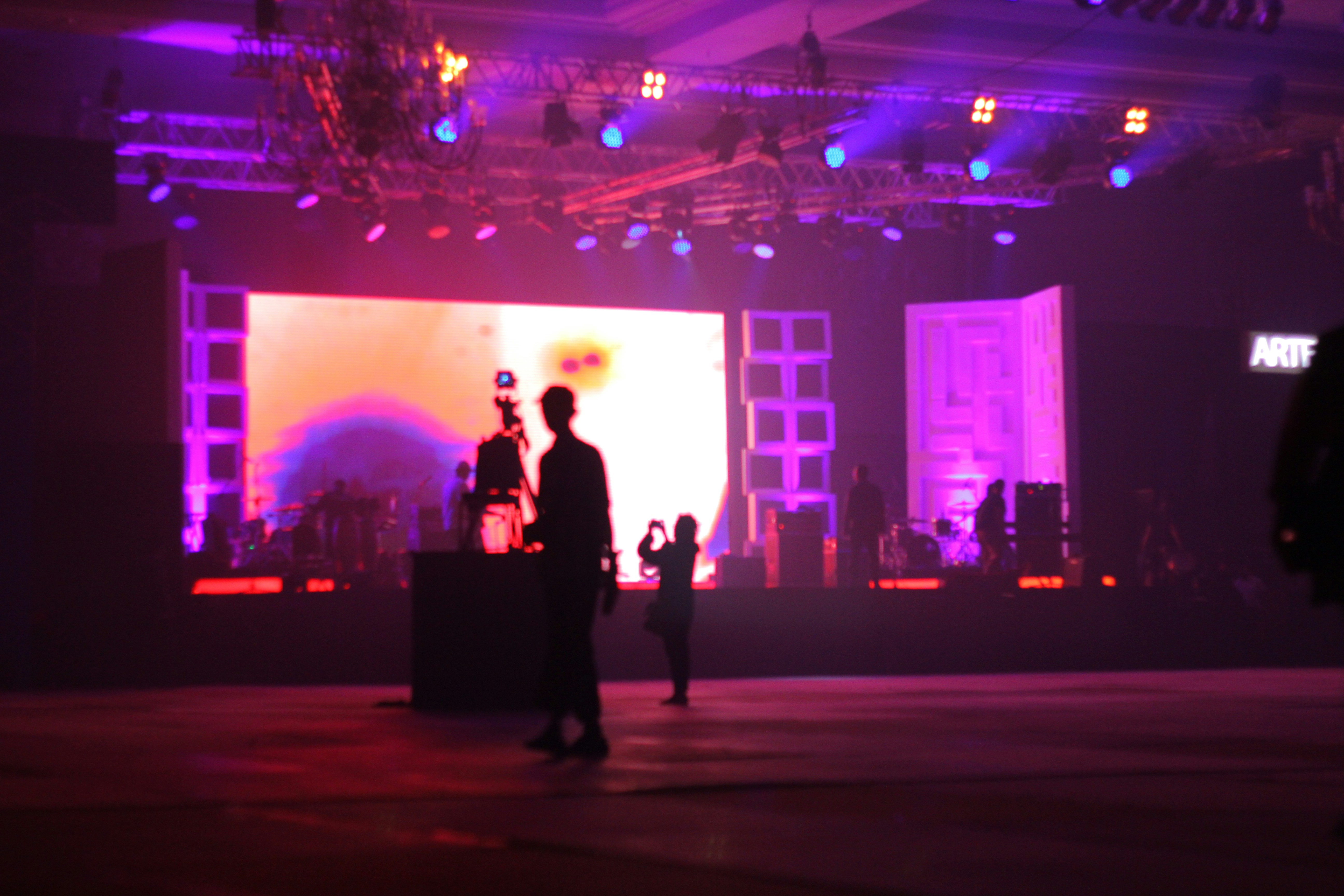 Awards night with elegant lighting design.